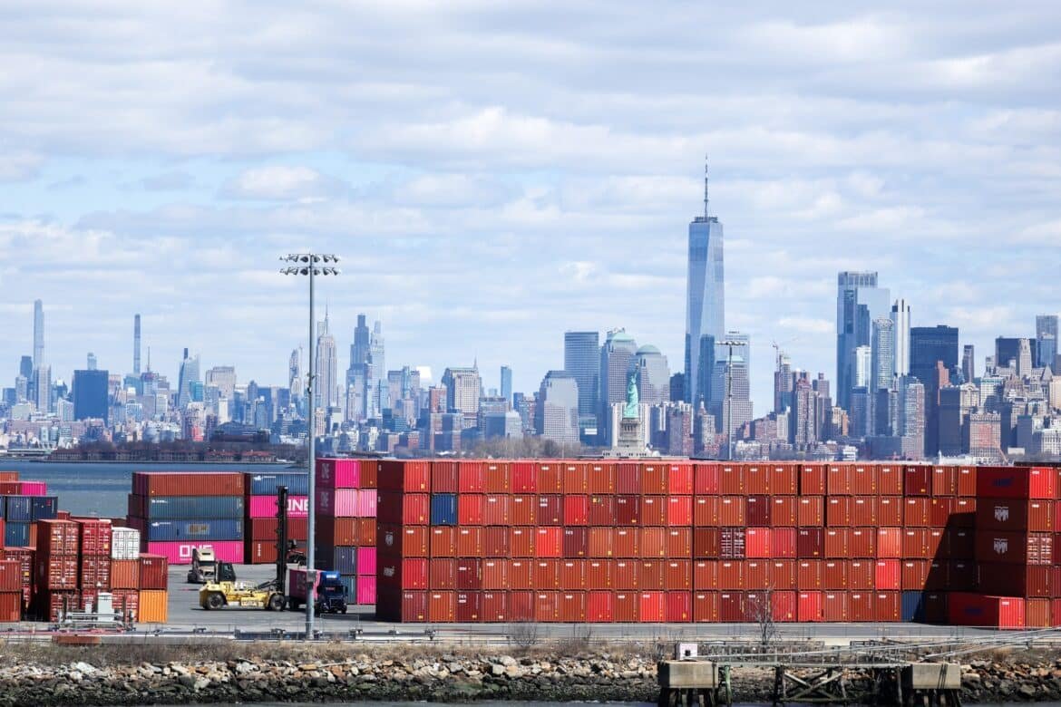 Photo: Shipping containers are seen in the Port Jersey container terminal, with the Manhattan horizon in the distance, in Jersey City, New Jersey, April 8, 2025. 