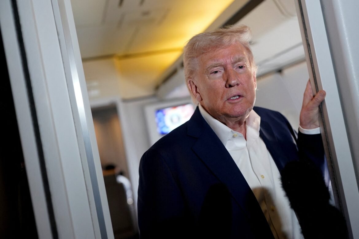 Photo: The president of the United States, Donald Trump, walks aboard Air Force One on the road to Palm Beach International Airport