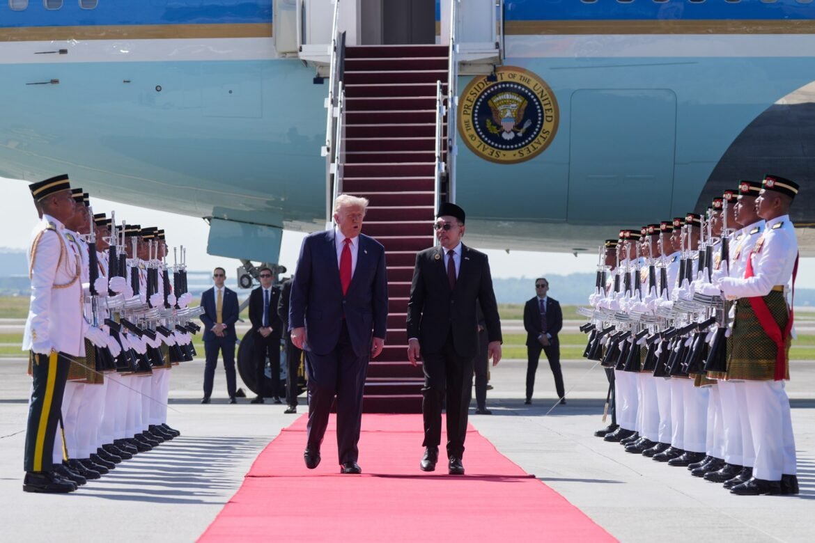 Trump arrives in Asia for a week of key talks, PHOTO: Donald Trump, Anwar Ibrahim