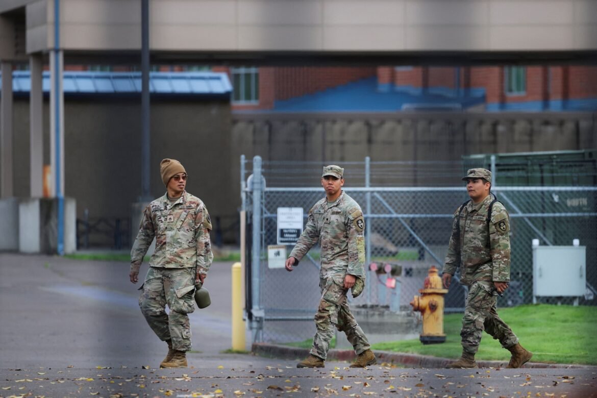 PHOTO: Members of the 49th California Military Police Brigade walk the grounds at the Oregon Army National Guard's Camp Withycombe in Happy Valley, Oregon, Oct. 22, 2025.  